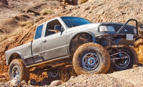 1997 Ford Ranger - Modified 1997 Ford Ranger tackling a steep, rocky incline off-road.