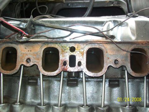 1972 Ford Ranchero - Engine internals exposed, showing the intake manifold mating surface and valve train components.