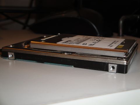 1993 Ford Taurus - Computer hard drives stacked on a desk.