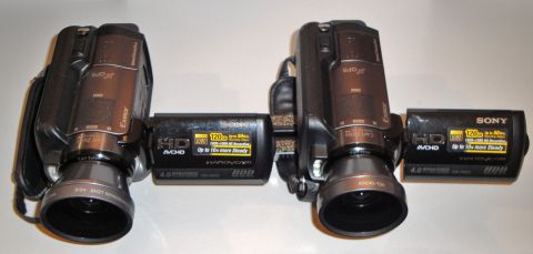 1993 Ford Taurus - Two Sony Handycam camcorders are displayed together, showing their lenses and recording modules.