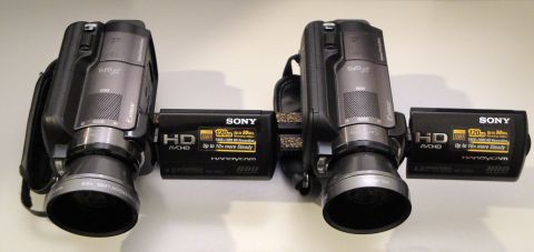 1993 Ford Taurus - Two Sony Handycam camcorders are shown, each HD AVCHD recording and 10x optical zoom.