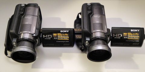 1993 Ford Taurus - Two Sony Handycam camcorders are displayed, each with visible branding and recording specifications.