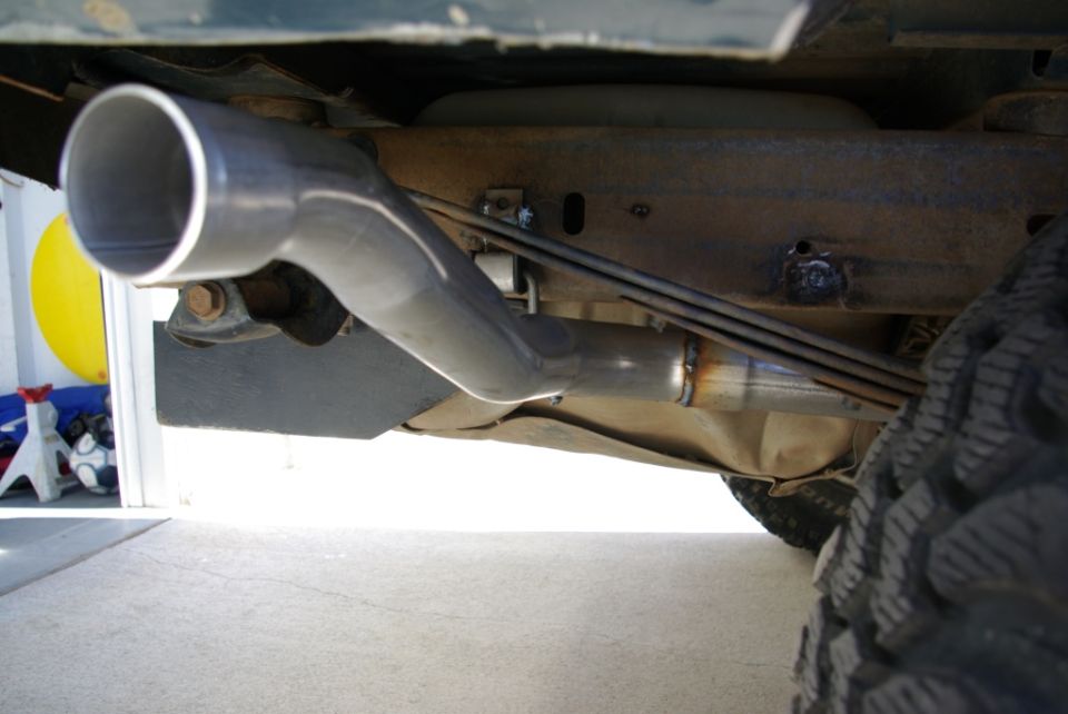 Exhaust pipe on vehicle underside