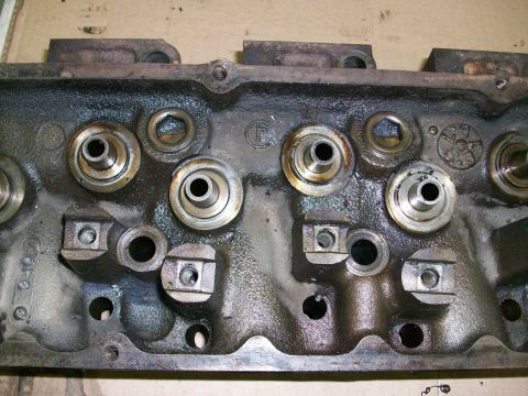 1973 Ford Ranchero - Close-up of an engine cylinder head, showing internal components.