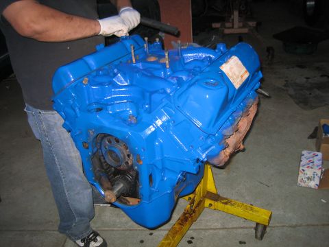 1979 Ford F-150 - Engine block painted blue and mounted on an engine stand for work.