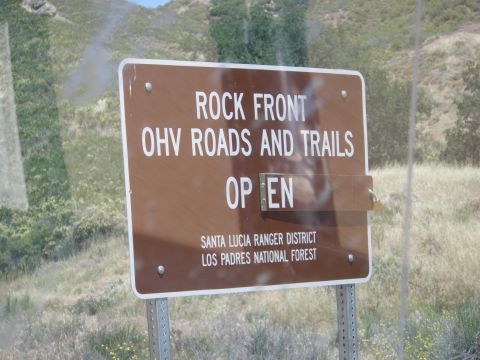 1991 Ford Bronco - A sign indicates that the Rock Front OHV roads and trails are open in the Los Padres National Forest.