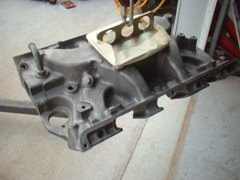 1969 Ford Torino - Found a date correct CJ intake in OK & had it shipped in. Cleaned it & installed new studs, primed & painted.