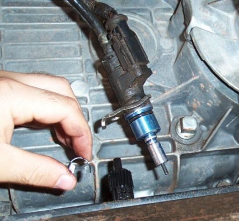 1990 Ford Bronco - Here it is with the speedo gear removed. Assembly is the reverse. You do NOT need to change the drive gear in the t-case