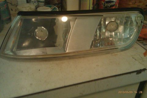 2000 Mercury Grand Marquis - A single headlight assembly is shown, likely a replacement part for a vehicle.
