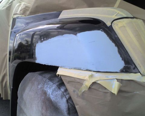 1993 Ford C-350 (Centurion Conversions) - Body panel repair in progress, showing filler application and masking.