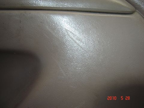 1993 Ford Bronco - Interior door panel detail with visible wear and tear.