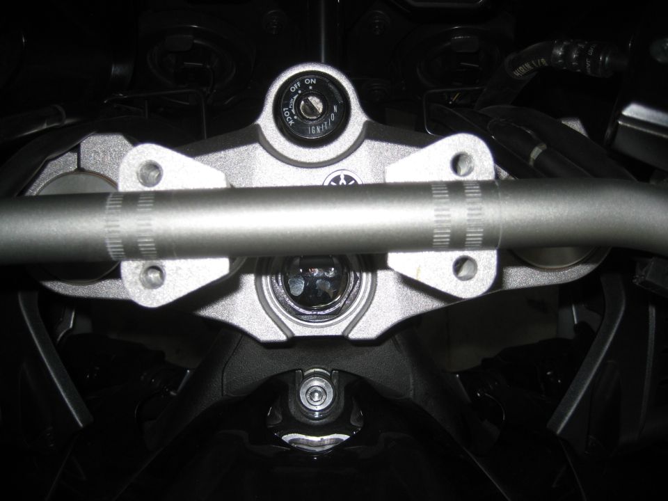 Motorcycle handlebars with ignition switch and Yamaha logo