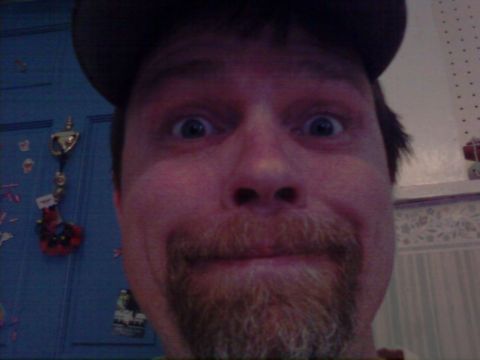 1989 Ford Bronco - A man with a surprised expression is captured in a close-up selfie.