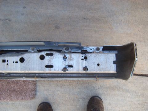 1973 Ford Ranchero - Front bumper assembly, likely from a pickup or car, showing mounting points and structural components.