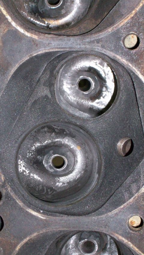1973 Ford Ranchero - This is a close-up view of an engine's cylinder head, showing the intake and exhaust ports.