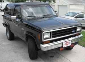 1985 Ford Bronco II - This black 1985 Ford Bronco II is shown from the front three-quarter view.