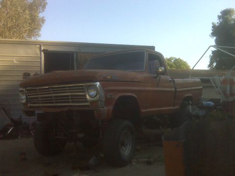 1969 Ford F-250 - This pickup truck has a distinctive grille that suggests a 1967 model year.