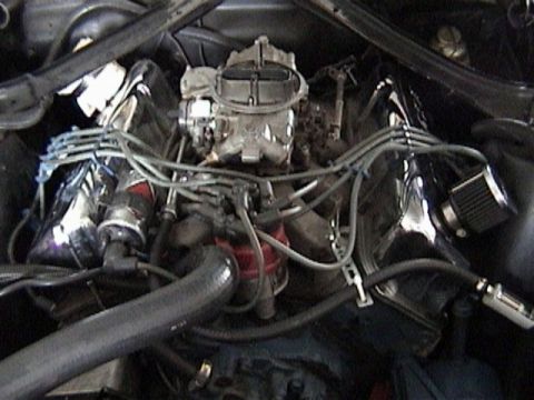 1968 Ford Mustang - Engine bay detail with carburetor and wiring visible.