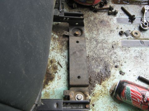 1978 Ford Bronco - drivers side rear seat base modifications had to elongate the the mounting holes