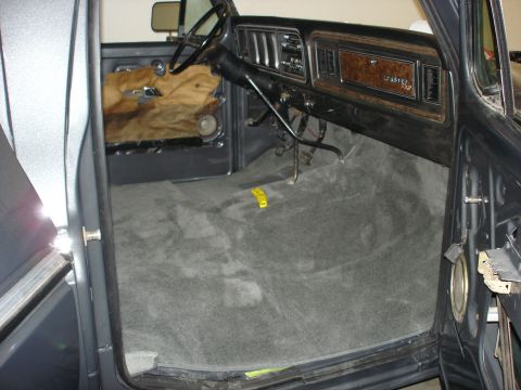 1979 Ford F-250 - Interior view of a 1979 Ford F-250 cab, gray carpet and the dashboard.