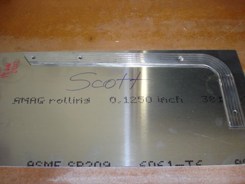 1979 Ford F-250 - Metal sheet with bent edge and stamped specifications, possibly a custom part.