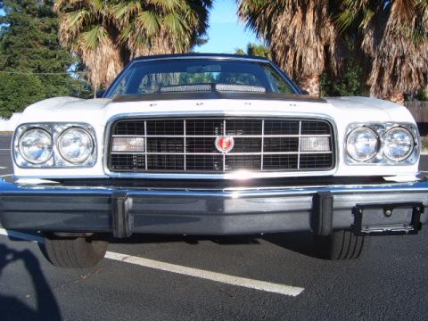 1973 Ford Ranchero - Front view of a 1973 Ford Ranchero showing its grille and headlights.