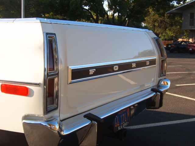 White 1973 Ford Ranchero rear with chrome bumper and tailgate lettering