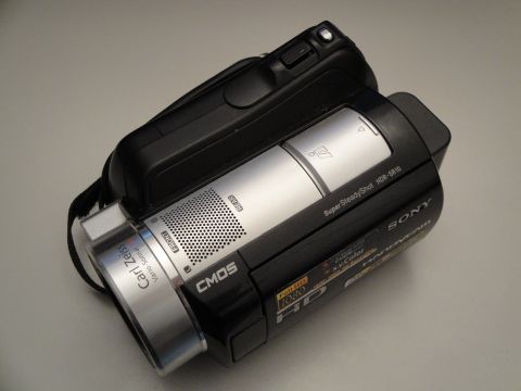1993 Ford Taurus - A Sony HDR-SR10 camcorder is shown, a Carl Zeiss Vario-Sonnar lens and Full HD 1080 recording capabilities.