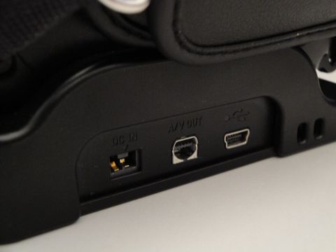 1993 Ford Taurus - Close-up of a camera's input and output ports, including DC IN, A/V OUT, and USB.