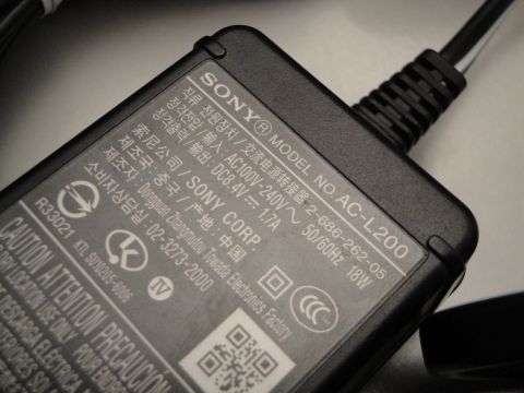 1993 Ford Taurus - Sony AC adapter with model number AC-L200 and output specifications visible.