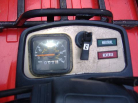 1989 Yamaha MOTO-4 - Close-up of an ATV's instrument panel, showing the speedometer and gear indicator lights.