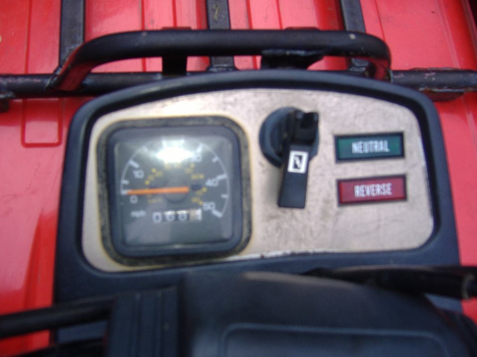 ATV instrument panel speedometer with neutral and reverse indicator lights