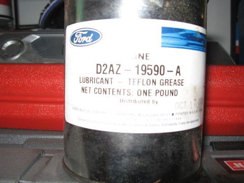1994 Ford Bronco - A can of Ford Teflon Grease is shown, with its part number and net weight clearly visible.