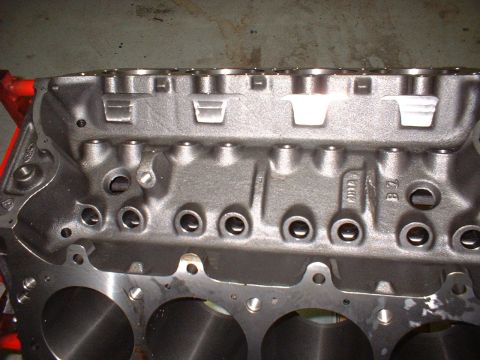 1956 Ford Crown Victoria - Close-up view of a gray engine block, showing internal components and casting marks.