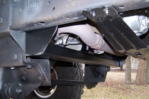 2000 Ford F-150 - Close-up of truck frame and exhaust system components.