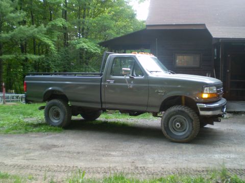 1979 Ford Bronco - This lifted Ford F-350 pickup truck appears to be from the early to mid-1990s, not a 1979 Bronco.