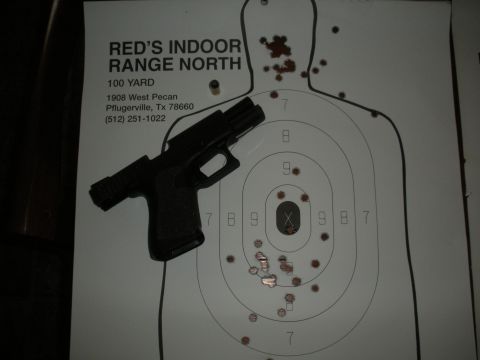 1996 Ford Bronco - Pistol and target from Red's Indoor Range North, 100 Yard.