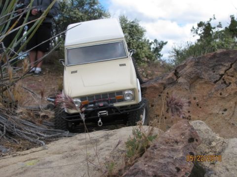 1988 Ford Bronco - A remote control vehicle navigates a rocky terrain on a sunny day.