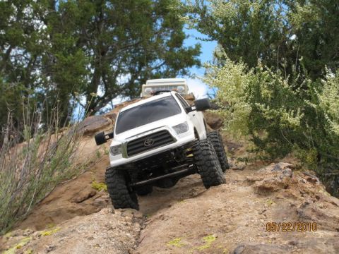 1988 Ford Bronco - RC Toyota Tundra truck navigating a rocky terrain on 05/22/2010.