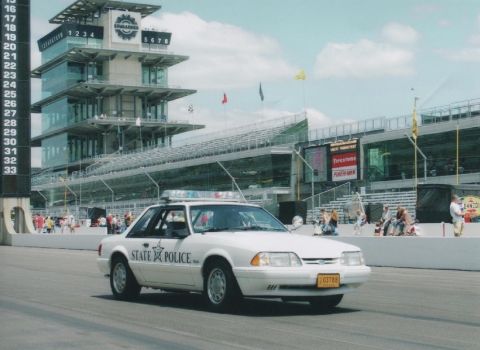 1993 Ford Mustang - State Police Mustang at the Indianapolis Motor Speedway, with the Pagoda visible in the background.