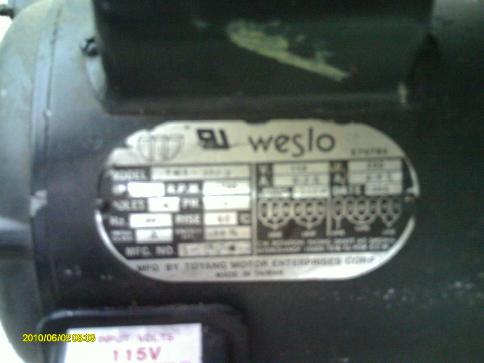 Close-up of a Weslo motor nameplate with wiring diagram