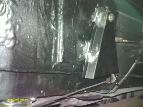 1987 Jaguar XJ6 - under car parking brake cable shield was missing, replaced and sprayed with truck bed liner