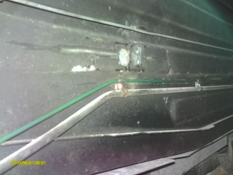 1987 Jaguar XJ6 - Replaced rear brake line that was all bent from hitting something apparently. The new green line is from a Jag at PicknPull. Still need gui…