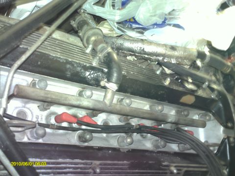 1987 Jaguar XJ6 - Cleaned spark plug wires and valley between cam covers.