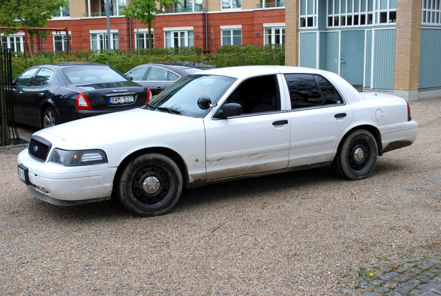 White 1998 Ford Crown Victoria sedan, 3q front view
