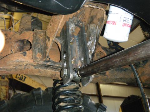 1978 Ford Bronco - This image shows a custom suspension modification, likely for off-road use, with a Motorcraft oil filter in view.