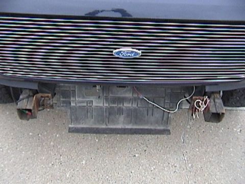 1995 Ford Bronco - Front view of a 1995 Ford Bronco, focusing on the grille and bumper details.