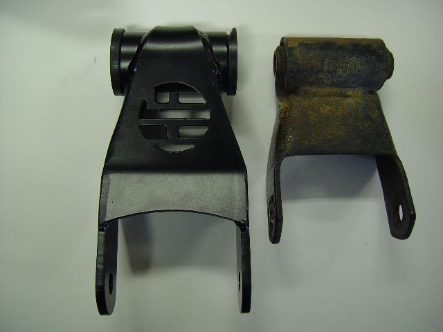 New black suspension part next to old rusty suspension part