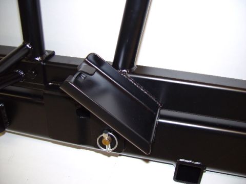 1993 Ford Bronco - This is a close-up view of an aftermarket rear bumper, showing a step and a securing pin.