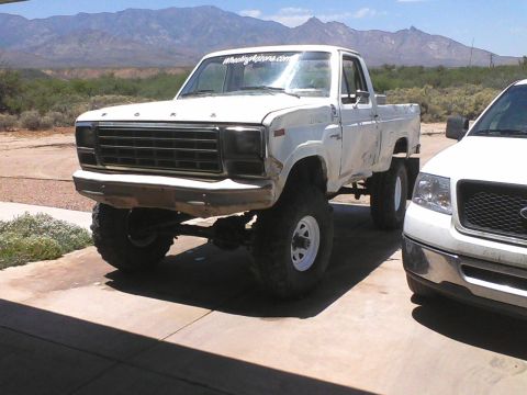 1981 Ford F-150 - This lifted pickup truck appears to be from the late 1970s, not a 1981 model.